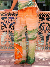 Pantalones anchos y holgados con detalle de lazo y estampado étnico único